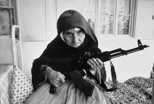 8.) 106-year-old Armenian woman guards her home in 1990.