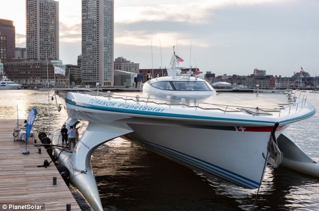 Here, the boat has 'closed' its solar panels allowing it to dock more easily